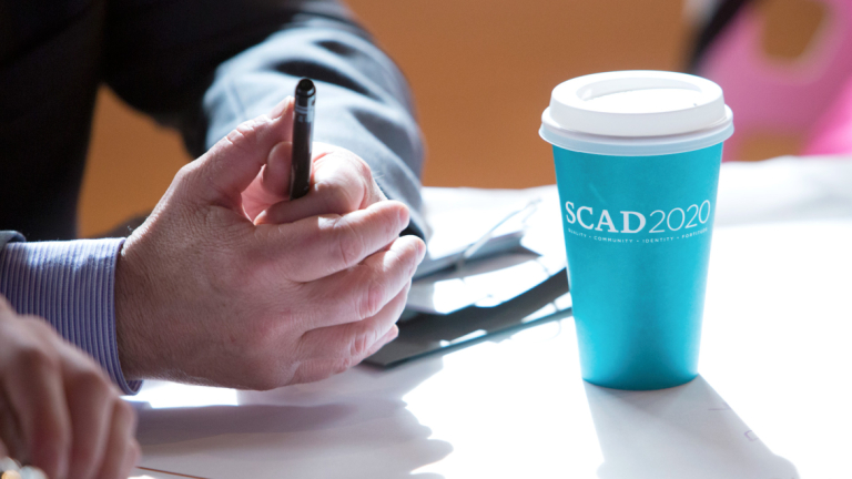 Establishing a strategic plan SCAD 2020 coffee cup at leadership retreat