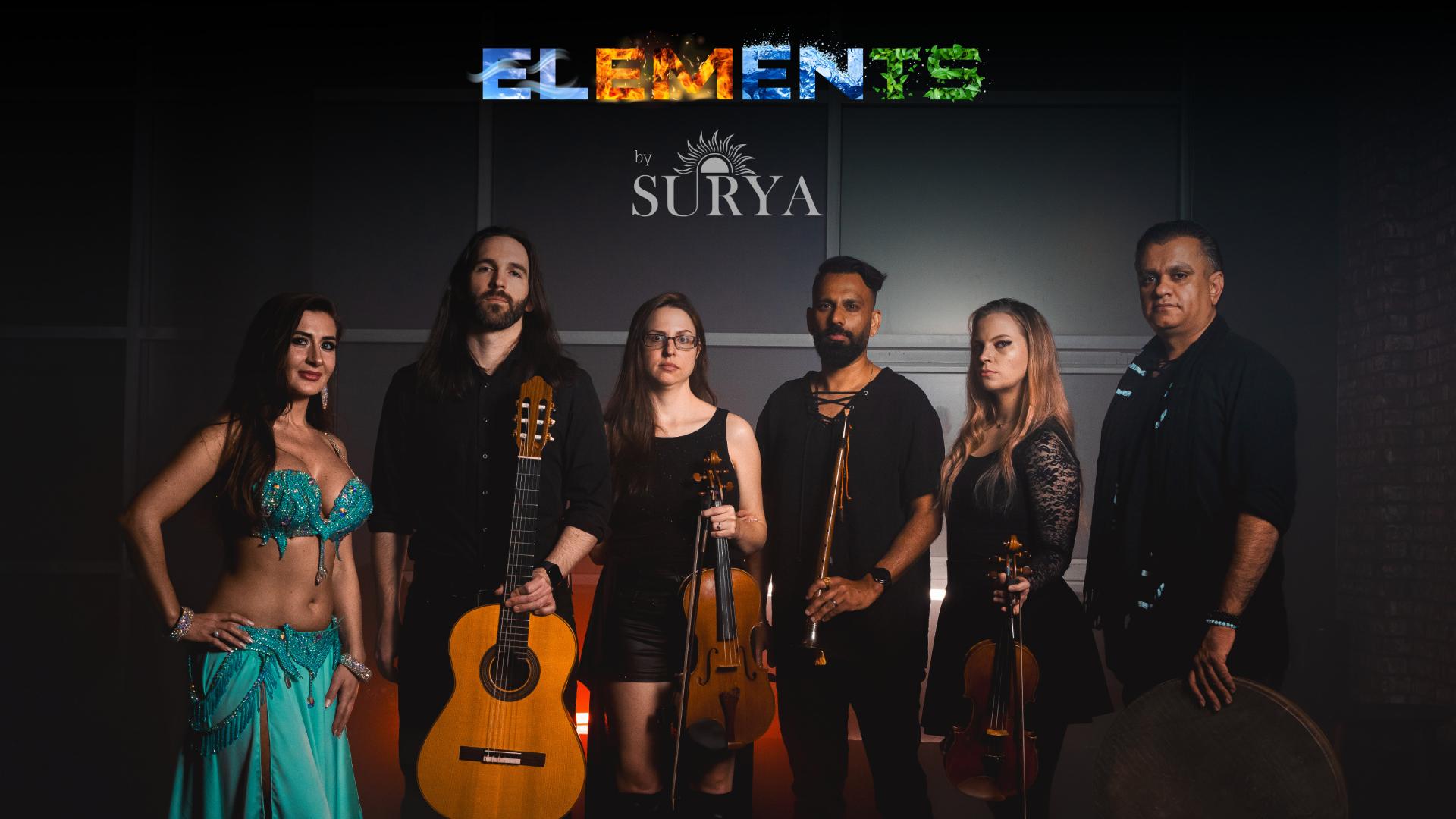 Suri Ensemble posing with instruments 